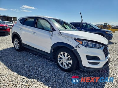 Czwarte zdjęcie samochodu z boku: 2020 HYUNDAI TUCSON SE VIN:KM8J2CA42LU226714 - miniatura