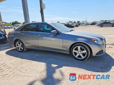 Czwarte zdjęcie samochodu z boku: 2014 MERCEDES-BENZ E 350 4MATIC VIN:WDDHF8JB2EA920378 - miniatura