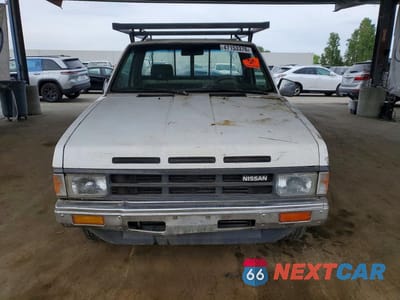 Piąte zdjęcie samochodu w środku: 1989 NISSAN TRUCK BASE VIN:1N6ND11S9KC364903 - miniatura