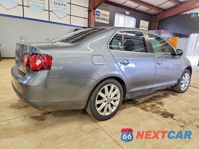 Trzecie zdjęcie samochodu z tyłu: 2009 VOLKSWAGEN JETTA TDI VIN:3VWRL71K19M063624 - miniatura