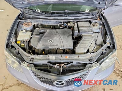 Zdjęcie 11 z 12 samochodu: 2005 MAZDA 3 I VIN:JM1BK32FX51317758 - miniatura