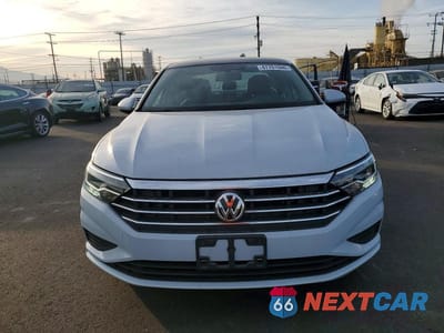 Piąte zdjęcie samochodu w środku: 2019 VOLKSWAGEN JETTA S VIN:3VWC57BU4KM117178 - miniatura