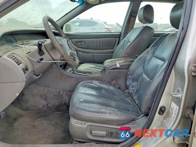 Zdjęcie 7 z 11 samochodu: 2000 TOYOTA AVALON XLS VIN:4T1BF28B8YU112151 - miniatura