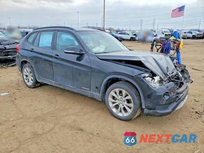 Czwarte zdjęcie samochodu z boku: 2014 BMW X1 XDRIVE28I VIN:WBAVL1C54EVY16145 - miniatura