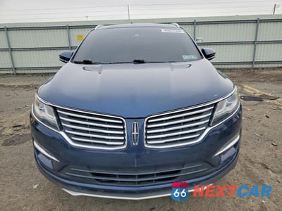 Piąte zdjęcie samochodu w środku: 2017 LINCOLN MKC RESERVE VIN:5LMCJ3D92HUL57018 - miniatura
