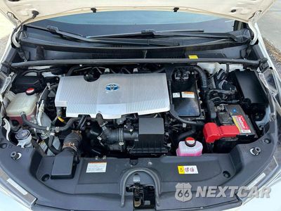 Zdjęcie 7 z 12 samochodu: 2016 TOYOTA PRIUS FOUR VIN:JTDKARFU7G3019819 - miniatura
