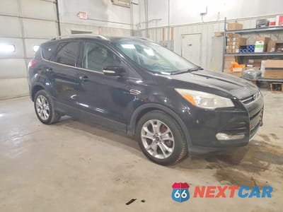 Czwarte zdjęcie samochodu z boku: 2014 FORD ESCAPE TITANIUM VIN:1FMCU0JX9EUB30223 - miniatura