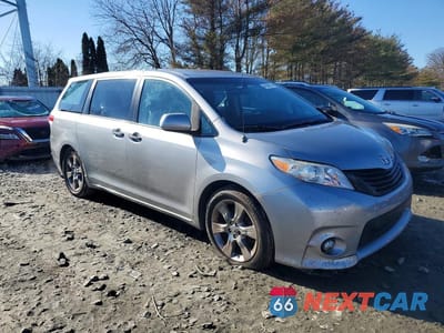 Czwarte zdjęcie samochodu z boku: 2014 TOYOTA SIENNA L 7-PASSENGER VIN:5TDZK3DC8ES470014 - miniatura