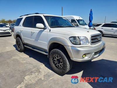 Czwarte zdjęcie samochodu z boku: 2002 TOYOTA SEQUOIA SR5 VIN:5TDZT34A62S109033 - miniatura