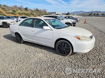 Czwarte zdjęcie samochodu z boku: 2002 TOYOTA CAMRY XLE VIN:4T1BE32K32U061652 - miniatura