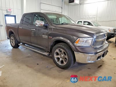 Czwarte zdjęcie samochodu z boku: 2017 RAM 1500 LARAMIE VIN:1C6RR7NT1HS507960 - miniatura