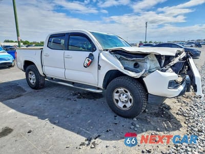 Czwarte zdjęcie samochodu z boku: 2019 TOYOTA TACOMA SR V6 VIN:3TMCZ5AN0KM210043 - miniatura