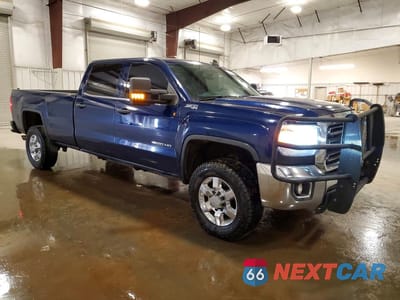 Czwarte zdjęcie samochodu z boku: 2015 GMC SIERRA K2500 SLE VIN:1GT12YEG6FF511351 - miniatura