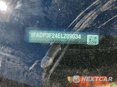 Zdjęcie 12 z 13 samochodu: 2014 FORD FOCUS SE VIN:1FADP3F24EL209034 - miniatura