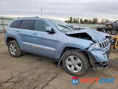 Czwarte zdjęcie samochodu z boku: 2013 JEEP GRAND CHEROKEE LAREDO VIN:1C4RJFAG6DC558099 - miniatura