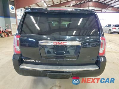 Zdjęcie 6 z 12 samochodu: 2016 GMC YUKON XL DENALI VIN:1GKS2HKJXGR334912 - miniatura