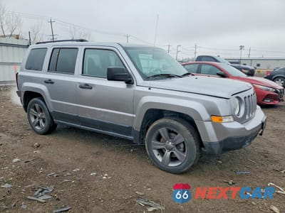 Czwarte zdjęcie samochodu z boku: 2016 JEEP PATRIOT SPORT VIN:1C4NJPBA1GD679197 - miniatura