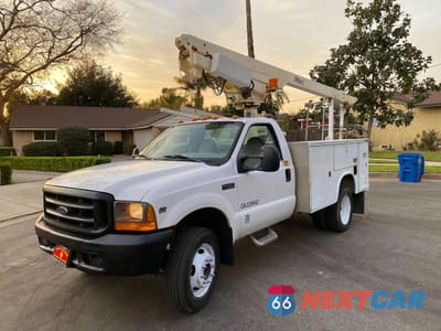 Drugie zdjęcie samochodu z przodu: 1999 FORD F-450 CONSTRUCTION TRUCKS BUCKET TRUCK VIN:1FDXF46S2XEE14161 - miniatura