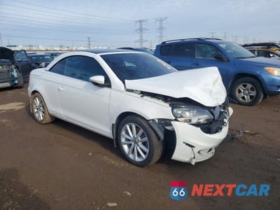 Czwarte zdjęcie samochodu z boku: 2014 VOLKSWAGEN EOS KOMFORT VIN:WVWBW8AH3EV005634 - miniatura