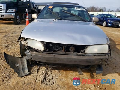 Piąte zdjęcie samochodu w środku: 1997 TOYOTA COROLLA DX VIN:1NXBB02E9VZ596488 - miniatura