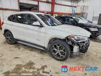 Czwarte zdjęcie samochodu z boku: 2016 BMW X1 XDRIVE28I VIN:WBXHT3C30GP881739 - miniatura