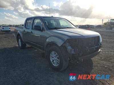 Czwarte zdjęcie samochodu z boku: 2016 NISSAN FRONTIER SV VIN:1N6AD0EV7GN777668 - miniatura