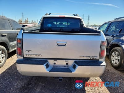 Zdjęcie 6 z 12 samochodu: 2006 HONDA RIDGELINE RTL VIN:2HJYK16536H537760 - miniatura