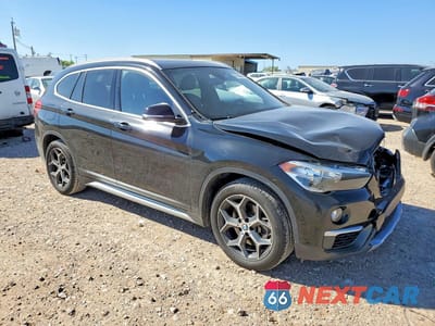 Czwarte zdjęcie samochodu z boku: 2018 BMW X1 SDRIVE28I VIN:WBXHU7C31J5L06699 - miniatura