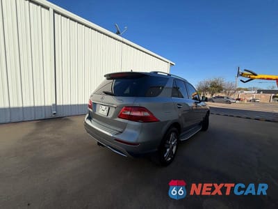 Czwarte zdjęcie samochodu z boku: 2013 MERCEDES-BENZ ML 350 VIN:4JGDA5JB3DA211037 - miniatura