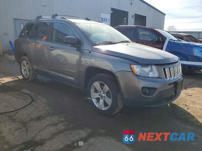 Czwarte zdjęcie samochodu z boku: 2011 JEEP COMPASS SPORT VIN:1J4NT1FAXBD290630 - miniatura