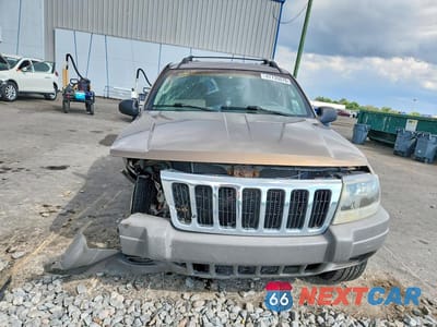 Piąte zdjęcie samochodu w środku: 2002 JEEP GRAND CHEROKEE LAREDO VIN:1J4GX48S42C306749 - miniatura