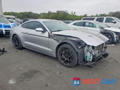 Czwarte zdjęcie samochodu z boku: 2019 FORD MUSTANG VIN:1FA6P8TH9K5101801 - miniatura
