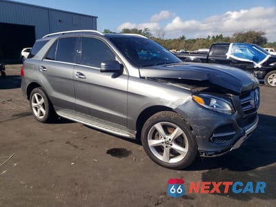 Czwarte zdjęcie samochodu z boku: 2018 MERCEDES-BENZ GLE 350 VIN:4JGDA5JB6JB174037 - miniatura