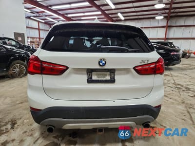 Zdjęcie 6 z 14 samochodu: 2016 BMW X1 XDRIVE28I VIN:WBXHT3C30GP881739 - miniatura