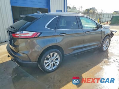 Trzecie zdjęcie samochodu z tyłu: 2020 FORD EDGE TITANIUM VIN:2FMPK4K95LBA41685 - miniatura