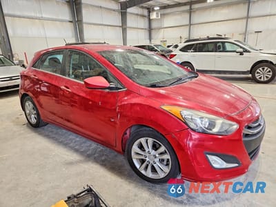 Czwarte zdjęcie samochodu z boku: 2014 HYUNDAI ELANTRA GT BASE VIN:KMHD35LH8EU210090 - miniatura