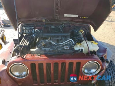 Zdjęcie 11 z 12 samochodu: 2004 JEEP WRANGLER X VIN:1J4FA39S64P711349 - miniatura