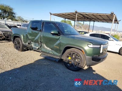 Czwarte zdjęcie samochodu z boku: 2025 RIVIAN R1T PREMIUM VIN:7FCTGCAP2SN038240 - miniatura