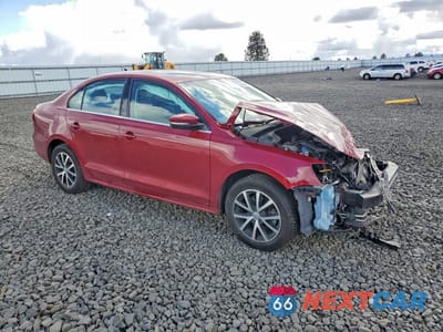 Czwarte zdjęcie samochodu z boku: 2017 VOLKSWAGEN JETTA SE VIN:3VWDB7AJ3HM403553 - miniatura