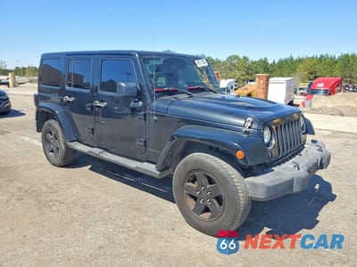 Czwarte zdjęcie samochodu z boku: 2015 JEEP WRANGLER UNLIMITED SAHARA VIN:1C4BJWEG2FL623268 - miniatura