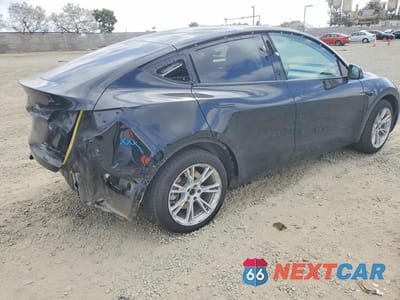 Trzecie zdjęcie samochodu z tyłu: 2023 TESLA MODEL Y VIN:7SAYGAEE6PF827721 - miniatura
