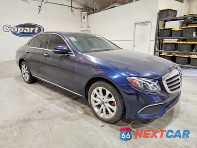 Czwarte zdjęcie samochodu z boku: 2017 MERCEDES-BENZ E 300 VIN:WDDZF4JB9HA235876 - miniatura