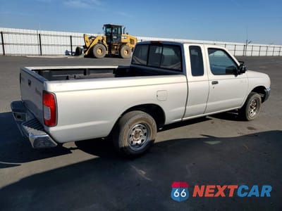 Trzecie zdjęcie samochodu z tyłu: 1999 NISSAN FRONTIER XE VIN:1N6DD26S3XC318209 - miniatura