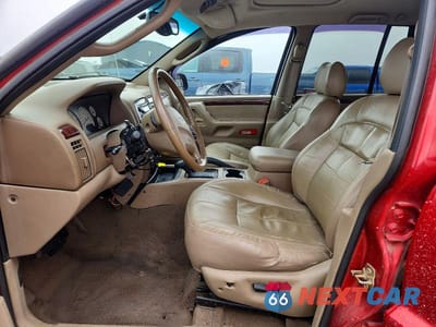 Zdjęcie 7 z 12 samochodu: 2002 JEEP GRAND CHEROKEE LIMITED VIN:1J4GW58J12C281213 - miniatura