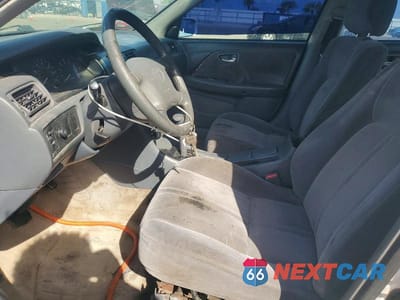 Zdjęcie 7 z 11 samochodu: 2001 TOYOTA CAMRY LE VIN:JT2BG22K010594520 - miniatura