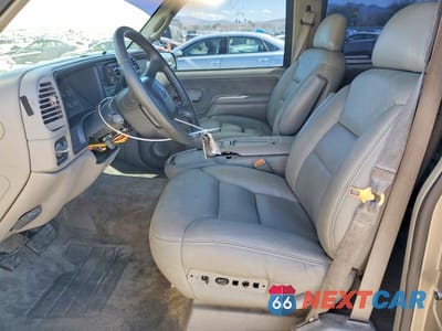 Zdjęcie 7 z 12 samochodu: 1999 CHEVROLET TAHOE C1500 VIN:1GNEC13R3XJ551161 - miniatura