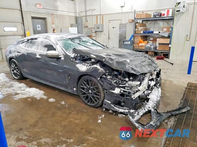 Czwarte zdjęcie samochodu z boku: 2020 BMW M850XI VIN:WBAGV8C07LCE33201 - miniatura