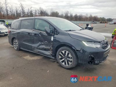 Czwarte zdjęcie samochodu z boku: 2025 HONDA ODYSSEY EXL VIN:5FNRL6H68SB020768 - miniatura