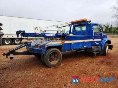Trzecie zdjęcie samochodu z tyłu: 1996 INTERNATIONAL 4700 TOW TRUCK VIN:1HTSCAAM5TH326568 - miniatura