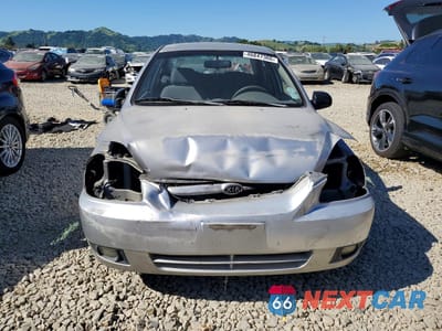 Piąte zdjęcie samochodu w środku: 2003 KIA RIO BASE VIN:KNADC125936228228 - miniatura